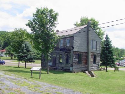 Fuller-Baker Log House and Marker. Click for full size. Fuller-Baker Log House and Marker image. Click for full size.