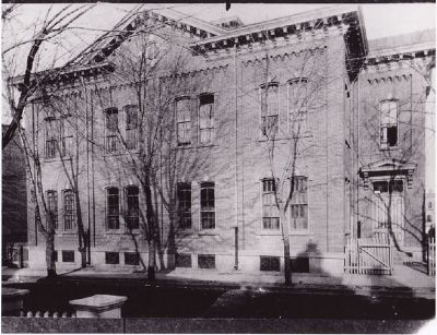 This is an undated photo of the first High School building. image. Click for full size.
