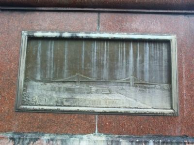 East River Bridge plaque on the left side of the pedestal.. Click for full size. East River Bridge plaque on the left side of the pedestal. image. Click for full size.
