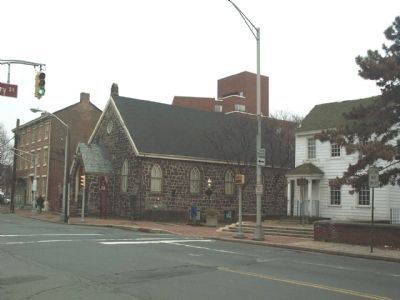 Front Street with the Playhouse on the left and Douglass House on the right. image. Click for full size.