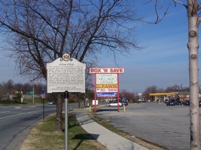 Marker with shopping center sign. image. Click for full size.