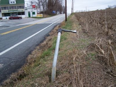 Remains of marker after being hit by a vehicle. image. Click for full size.