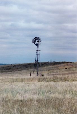 One of Many Windmill Water Pumps That Dot the Landscape thru This Region image. Click for full size.