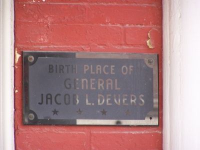 Marker on porch of house. image. Click for full size.