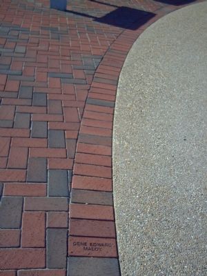 Bricks with victim's names surround the sundial. image. Click for full size.