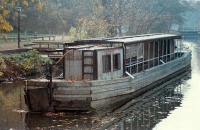 Boats similar to this were pulled through the locks and along the canal image. Click for full size.