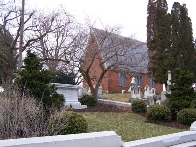 Grave is near the brick chapel. image. Click for full size.