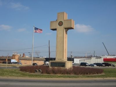 West Side of Cross, with plaque image. Click for more information.