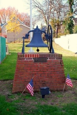 Photo of marker underneath bell image. Click for full size.