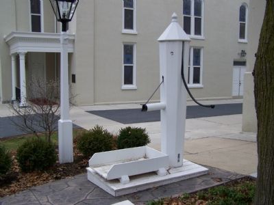 Historic water pump adjacent to Heritage Center marker. image. Click for full size.