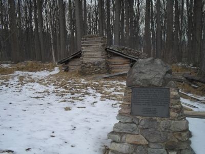 Marker with Hut in background image. Click for full size.