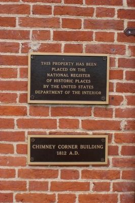 Markers on the east wall of the building. Click for full size. Markers on the east wall of the building image. Click for full size.