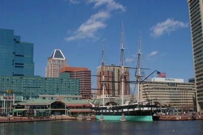 USS Constellation with Baltimore skyline in the background image. Click for full size.