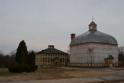 Marker is in front of the bushes, to the left of the conservatory image. Click for full size.