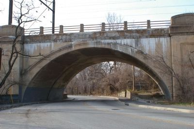 View under the railroad bridge with "Bridging Gwynns Falls" marker in the distance image. Click for full size.