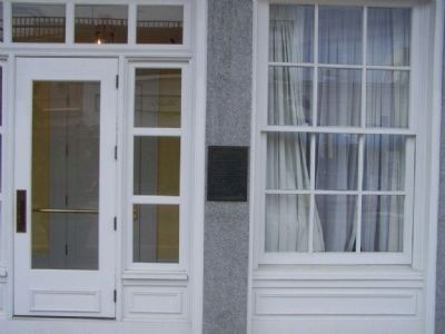 Printing Office of James Johnston Marker beside a hotel door. Click for full size. Printing Office of James Johnston Marker beside a hotel door image. Click for full size.