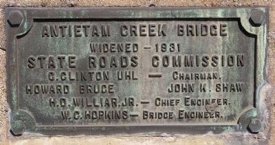 Plaque added when the bridge was widened in 1931 image. Click for full size.