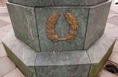 <i>Liberty in Distress</i> Wreath on pedestal beneath Lady Liberty image. Click for full size.