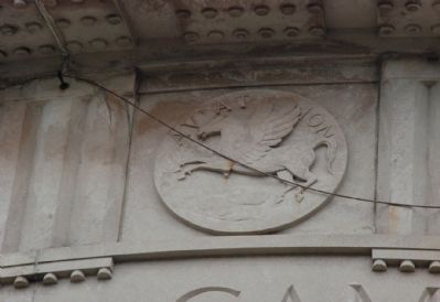 One of several Aviation symbols on the outside of the Greek Temple image. Click for full size.