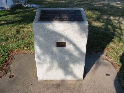 Monument with marker atop image. Click for full size.
