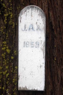 Posted on tree to the left of the grave. Click for full size. Posted on tree to the left of the grave image. Click for full size.