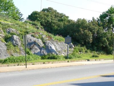 Marker in Front of the Rock Outcropping image. Click for full size.