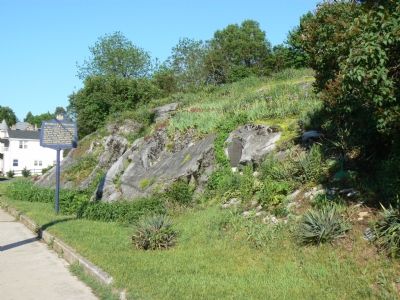 The fort marker on the rock face and the newer marker on the street. image. Click for full size.