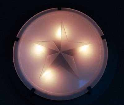 Lighting inside the monument is decorated with the Lone Star of Texas image. Click for full size.