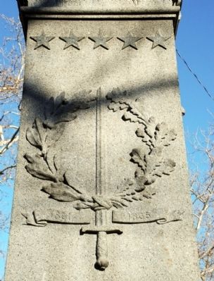 Sword and Wreath above a ribbon with the dates of the Civil War image. Click for full size.