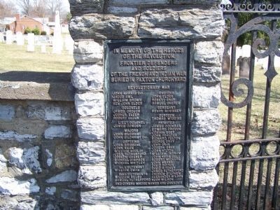 Plaque on left of cemetery gate. image. Click for full size.