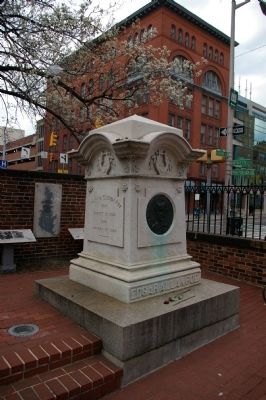Marker is to the left, behind Poe's grave image. Click for full size.