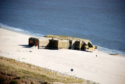 View of World War II gun emplacement from the top of the lighthouse. image. Click for full size.