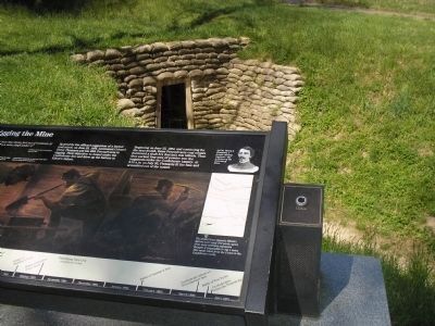 Marker with Mine in Background. Click for full size. Marker with Mine in Background image. Click for full size.