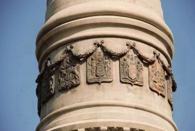 Colonial Coats-of Arms above the historic brass relief murals. Click for full size. Colonial Coats-of Arms above the historic brass relief murals image. Click for full size.