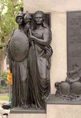 Two of the four allegorical female figures, "War" and "Liberty." image. Click for full size.