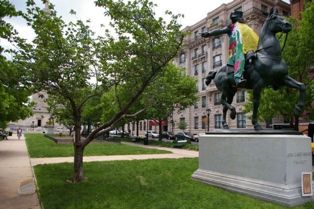 Marker, crabapple tree, and statue of John Eager Howard. image. Click for full size.