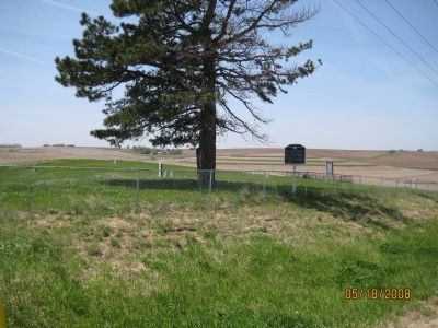 The cemetery sits alone, surrounded by farm fields.. Click for full size. The cemetery sits alone, surrounded by farm fields. image. Click for full size.
