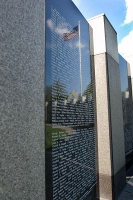First Panel of Names with American Flag Reflection image. Click for full size.
