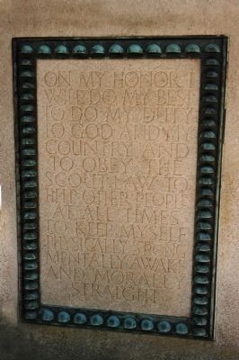 The Boy Scout oath is engraved on the pedestal of the statue image. Click for full size.
