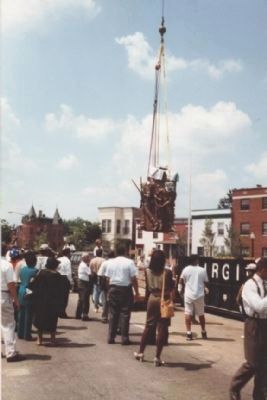 "The Spirit of Freedom" is lowered into place at the still unfinished memorial. Click for full size. "The Spirit of Freedom" is lowered into place at the still unfinished memorial image. Click for full size.