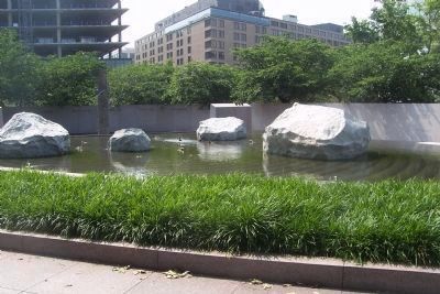 View from east sidewalk, across the Zen-inspired pool and garden. Click for full size. View from east sidewalk, across the Zen-inspired pool and garden image. Click for full size.