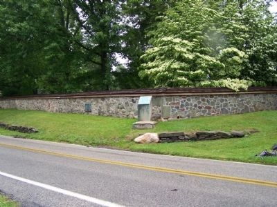 Birmingham Cemetery Wall with several markers visible. image. Click for full size.