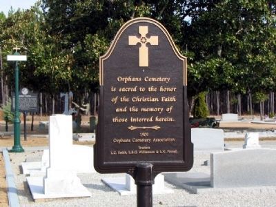 Small Marker in Orphans Cemetery, with marker visible in distance image. Click for full size.