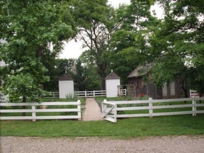 Outbuildings next to the historical home image. Click for full size.