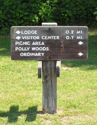 Directional Sign to Polly Woods' Ordinary image. Click for full size.