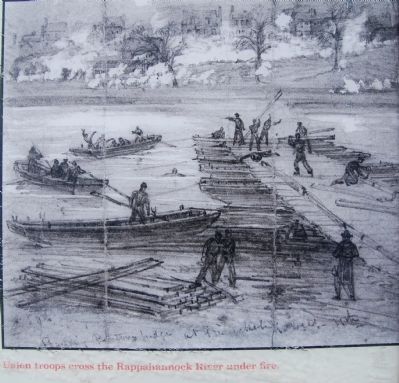 Union troops cross the Rappahannock River under fire. image. Click for full size.