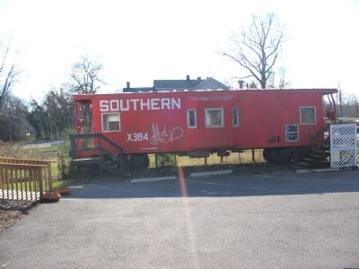 Railroad caboose outside Haymarket Museum image. Click for full size.