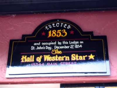 Sign over right door image. Click for full size.