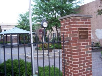 The park next to the historical marker contains one of the structures where people waited. image. Click for full size.