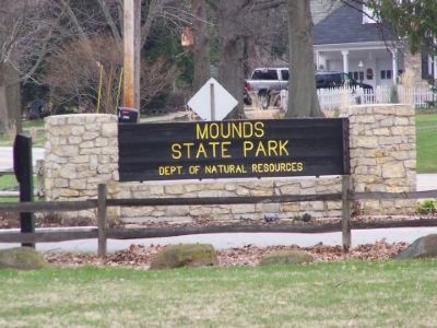 The wooden sign at the front of Mounds State Park. image. Click for full size.